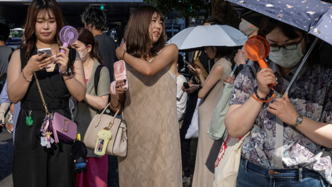 Galerie Foto Japonia a înregistrat cea mai ridicată temperatură din istoria măsurătorilor: s-a dublat numărul oamenilor internați din cauza căldurii